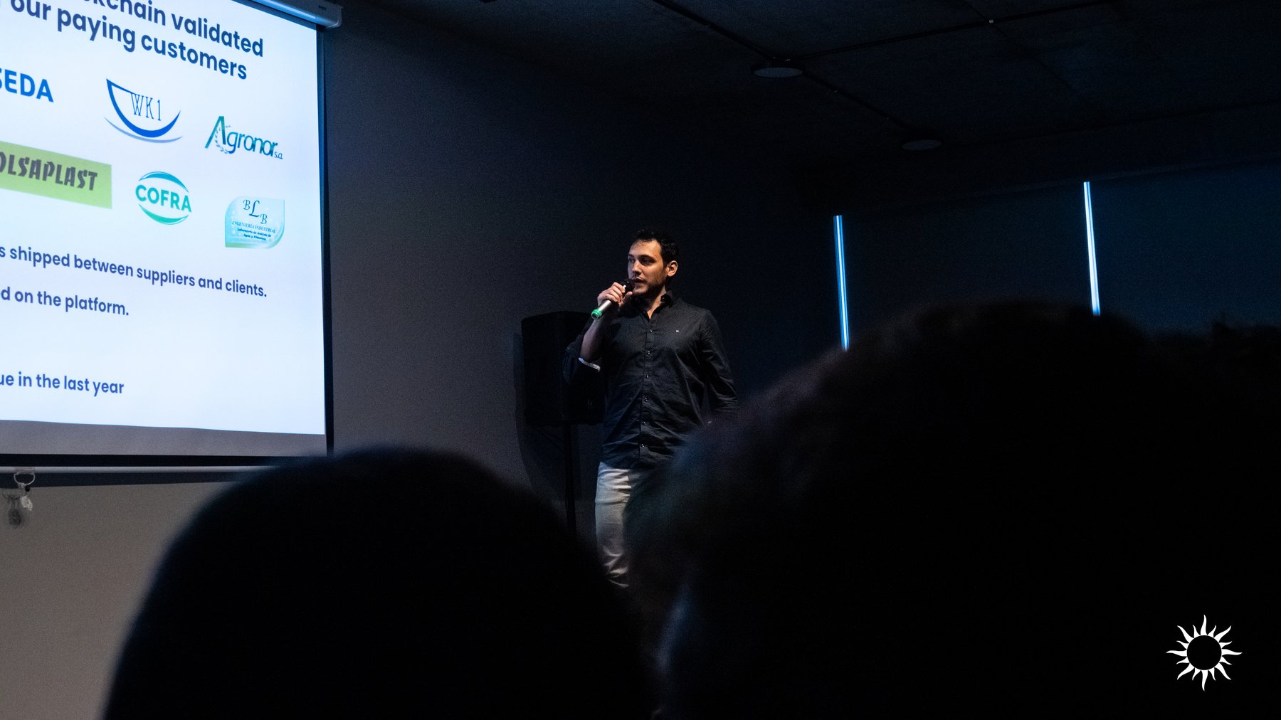 A founder pitching their startup at the Rayuela Demo Day